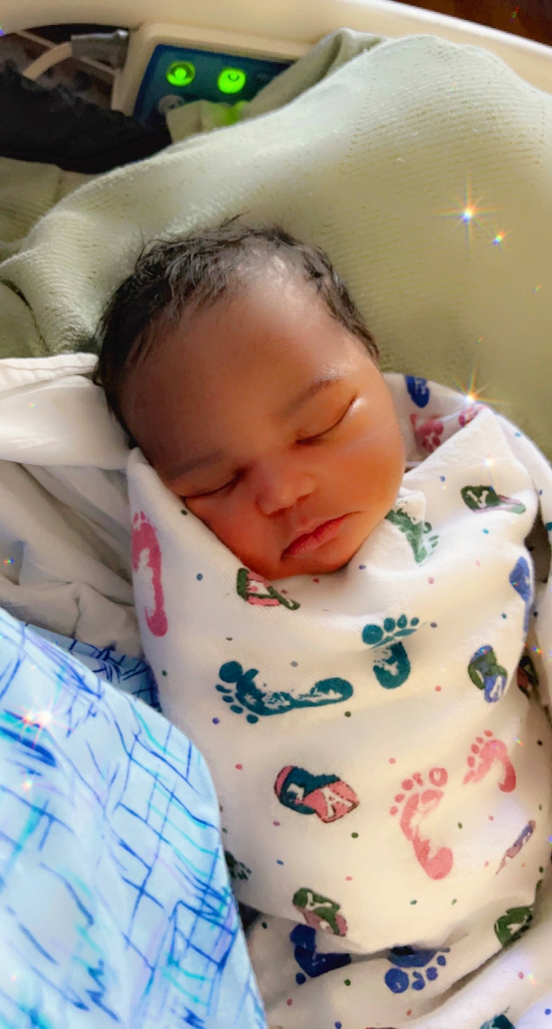 Bailey is registered to the contest to win money with this photo: baby, baby_products, baby_toddler_clothing, bedtime, cheek, child, chin, comfort, face, head, linens, lip, mouth, neck, nose, person, room, skin, sleeve, textile