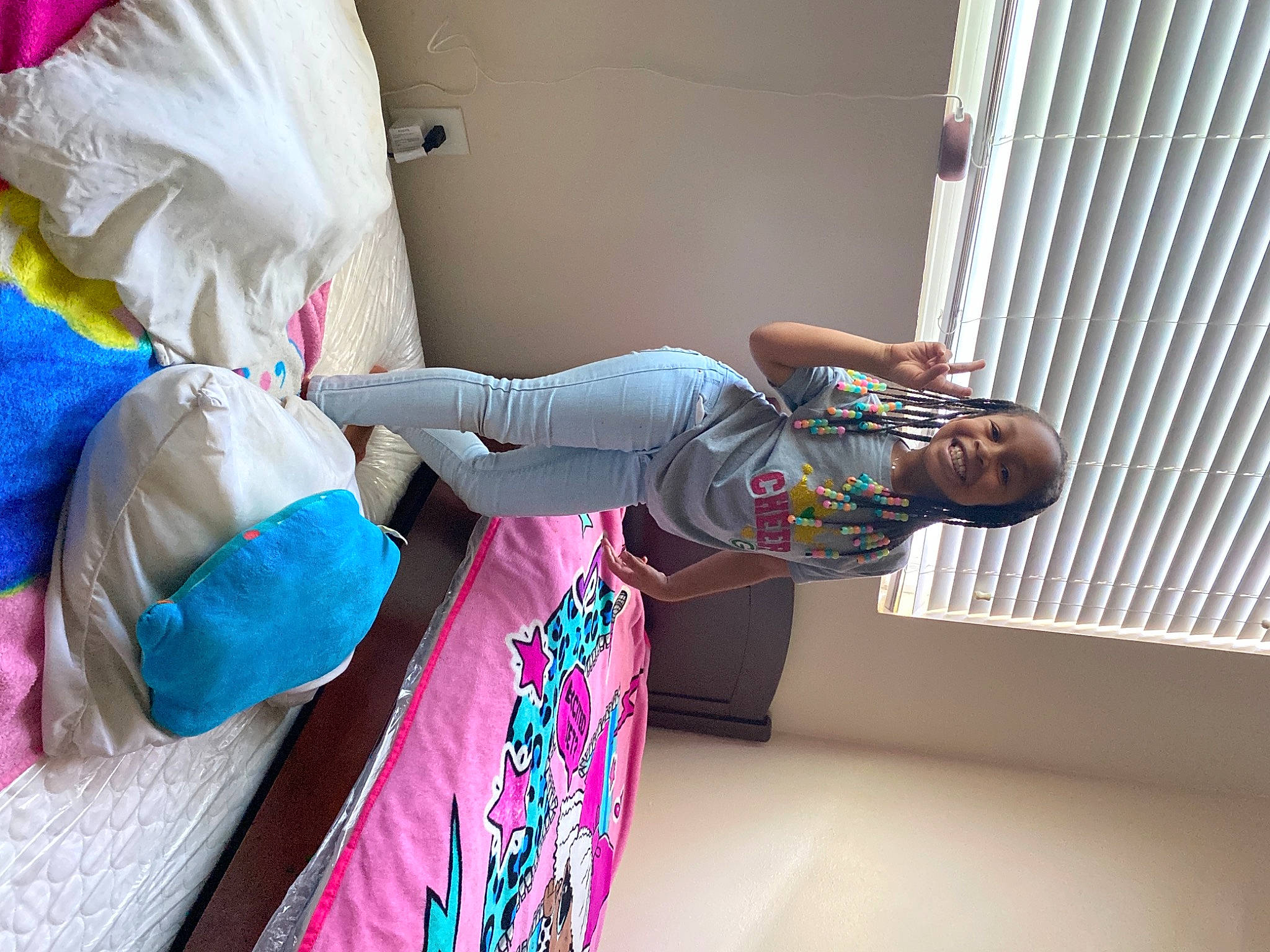 Amari is registered to the contest to win money with this photo: child, door, event, fashion, fashion_design, fun, joy, linens, magenta, pattern, person, pink, plastic, plastic_bag, room, street_fashion, t_shirt, textile, visual_arts, window