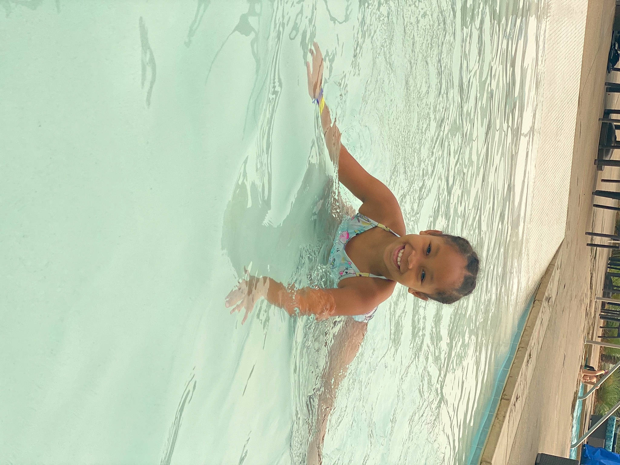 Amari joined the competition — help win amazing prizes! bathing, beach, child, elbow, fun, happy, joy, lake, leisure, ocean, people_in_nature, person, recreation, sky, smile, swimwear, toddler, vacation, water, wave