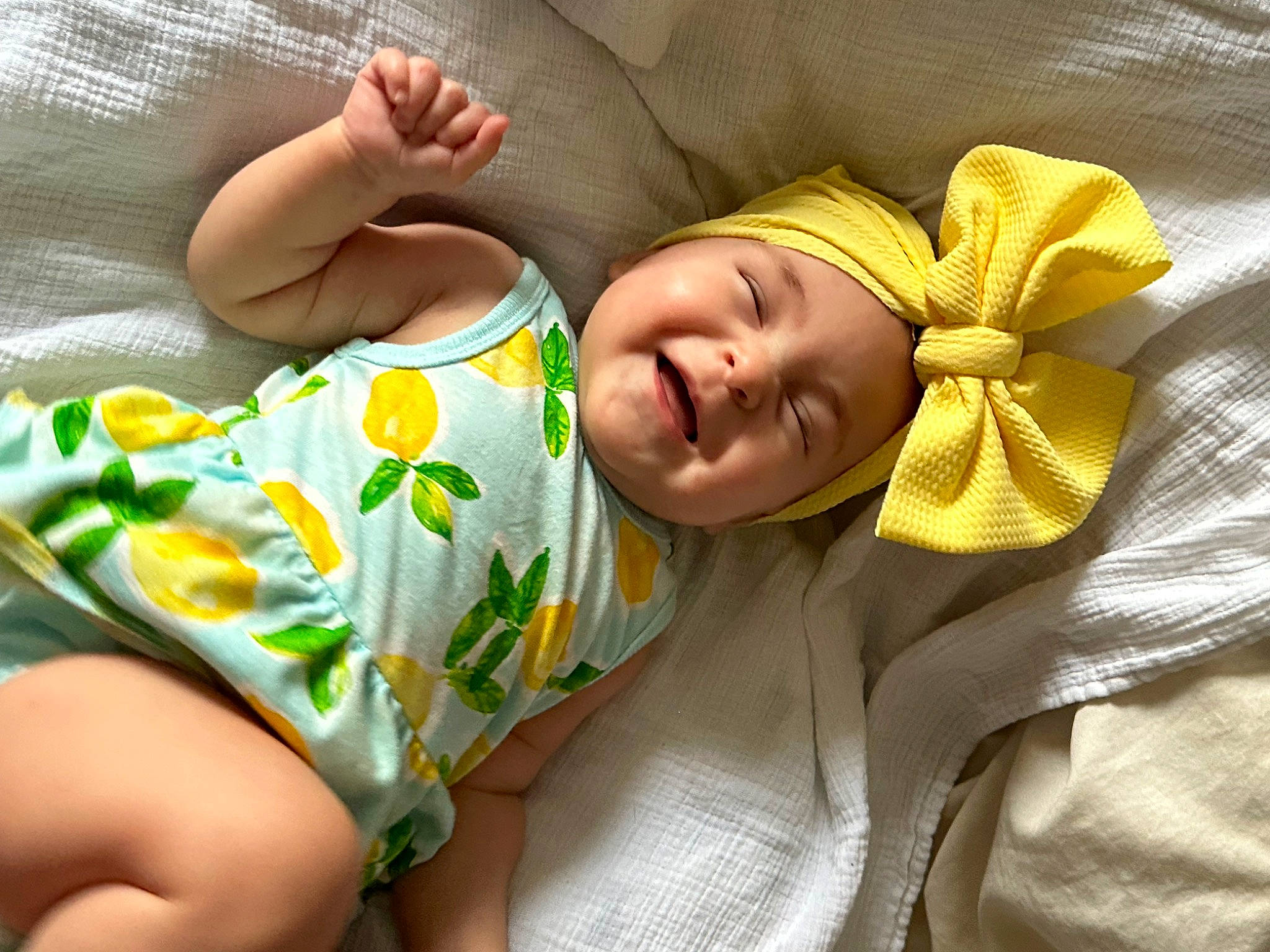 Delilah joined the competition — help win amazing prizes! baby, baby_products, baby_sleeping, baby_toddler_clothing, bedding, bedtime, child, comfort, fashion_accessory, grass, happy, headwear, human_leg, linens, nap, person, room, skin, sleep, sleeve