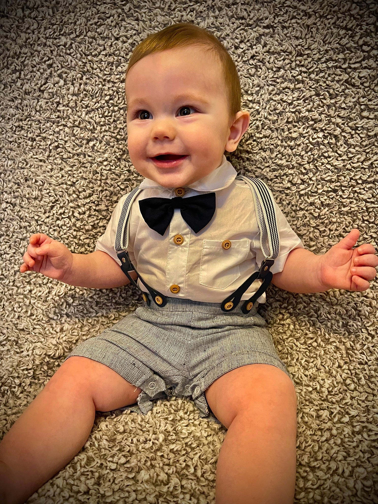 Jasper is registered to the contest to win money with this photo: baby, baby_toddler_clothing, dress_shirt, facial_expression, finger, flash_photography, flooring, fun, grass, happy, human_body, joy, leg, people_in_nature, person, skin, sleeve, smile, standing, tie
