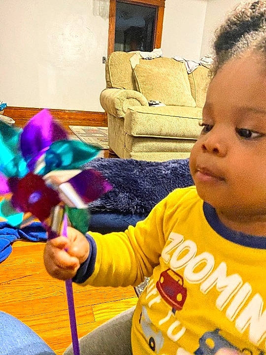 Messiah joined the competition — help win amazing prizes! artist, chair, child, couch, event, fun, hairstyle, happy, head, person, picture_frame, plant, play, room, sitting, t_shirt, toddler, toy, tree, visual_arts