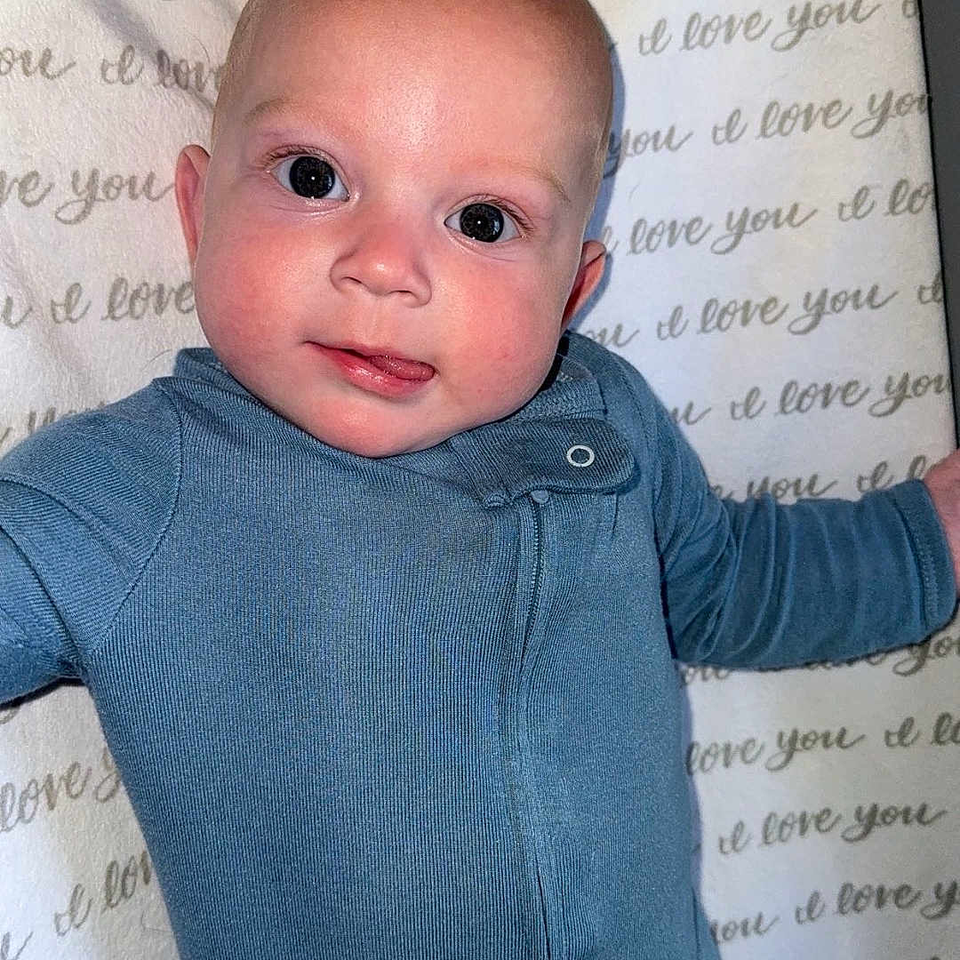 Kaycen is registered to the contest to win money with this photo: baby, bodypart, clothing, cushion, face, finger, furniture, hand, head, homedecor, jeans, longsleeve, newborn, pants, person, photography, portrait, shirt, sleeve, t_shirt