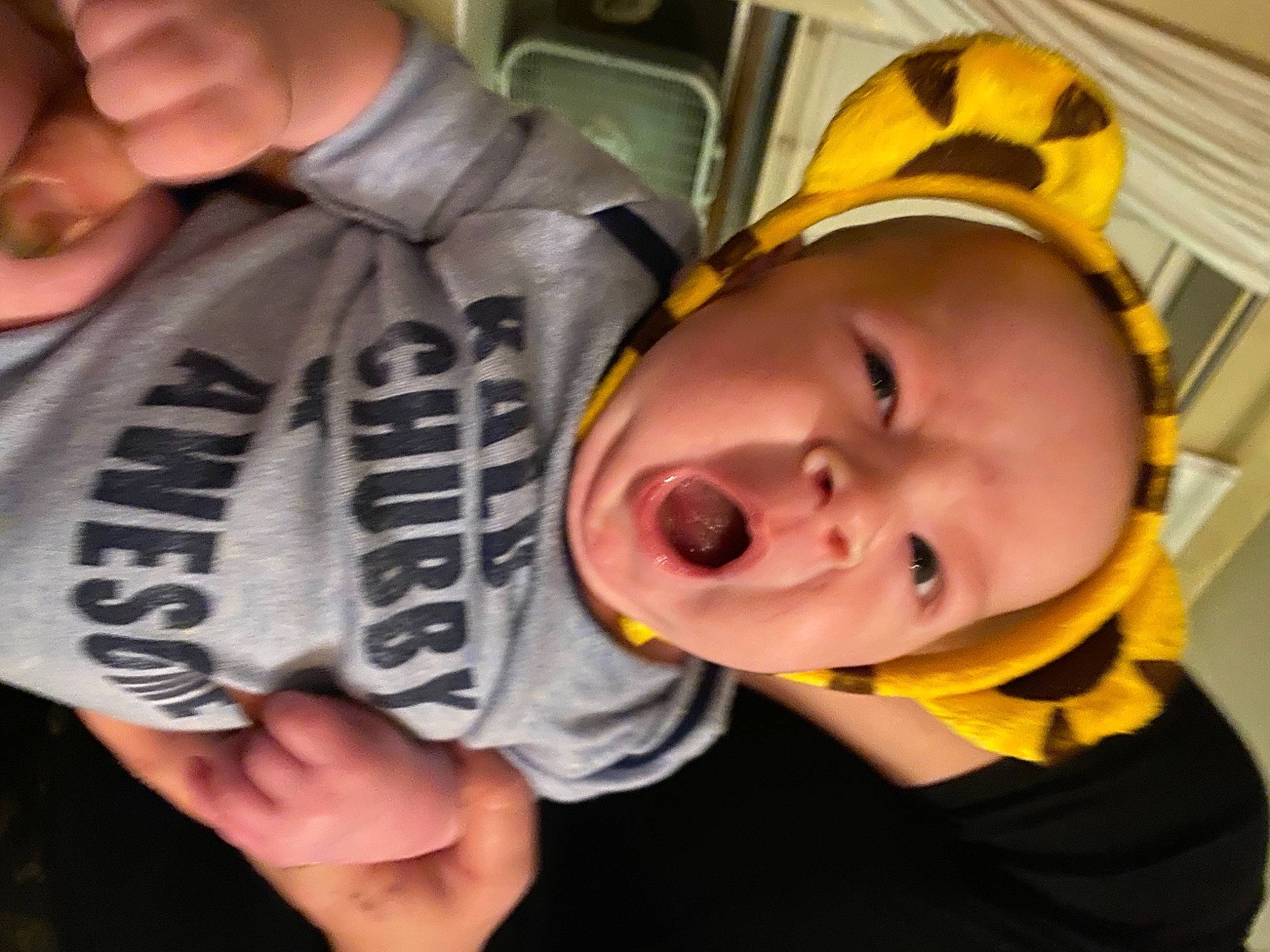 Tripp joined the competition — help win amazing prizes! baby, child, finger, mouth, person, smile, thumb, toddler, yellow