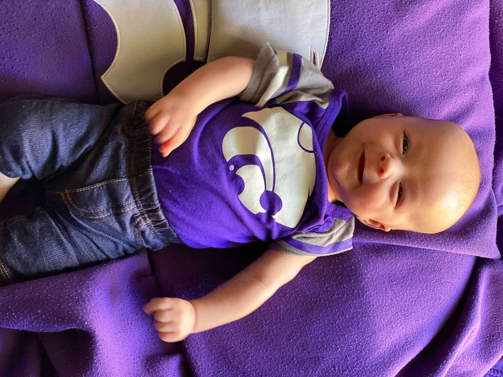 Slater is registered to the contest to win money with this photo: arm, baby, baby_sleeping, birth, cheek, child, comfort, hand, nap, person, plant, product, purple, skin, sleep, toddler, violet