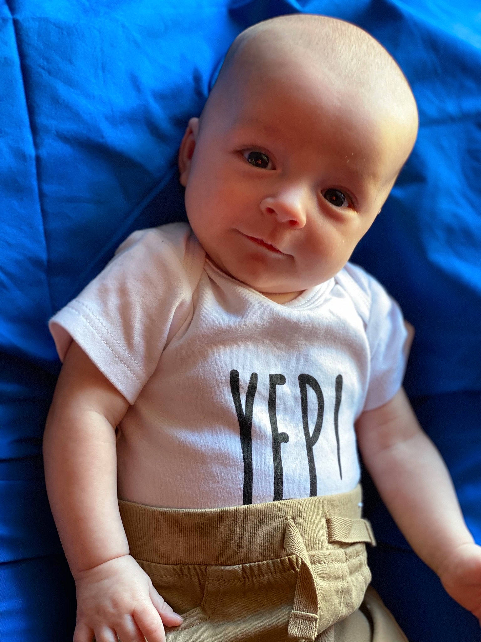 Slater is registered to the contest to win money with this photo: baby, baby_products, baby_toddler_clothing, cheek, child, head, person, skin, toddler