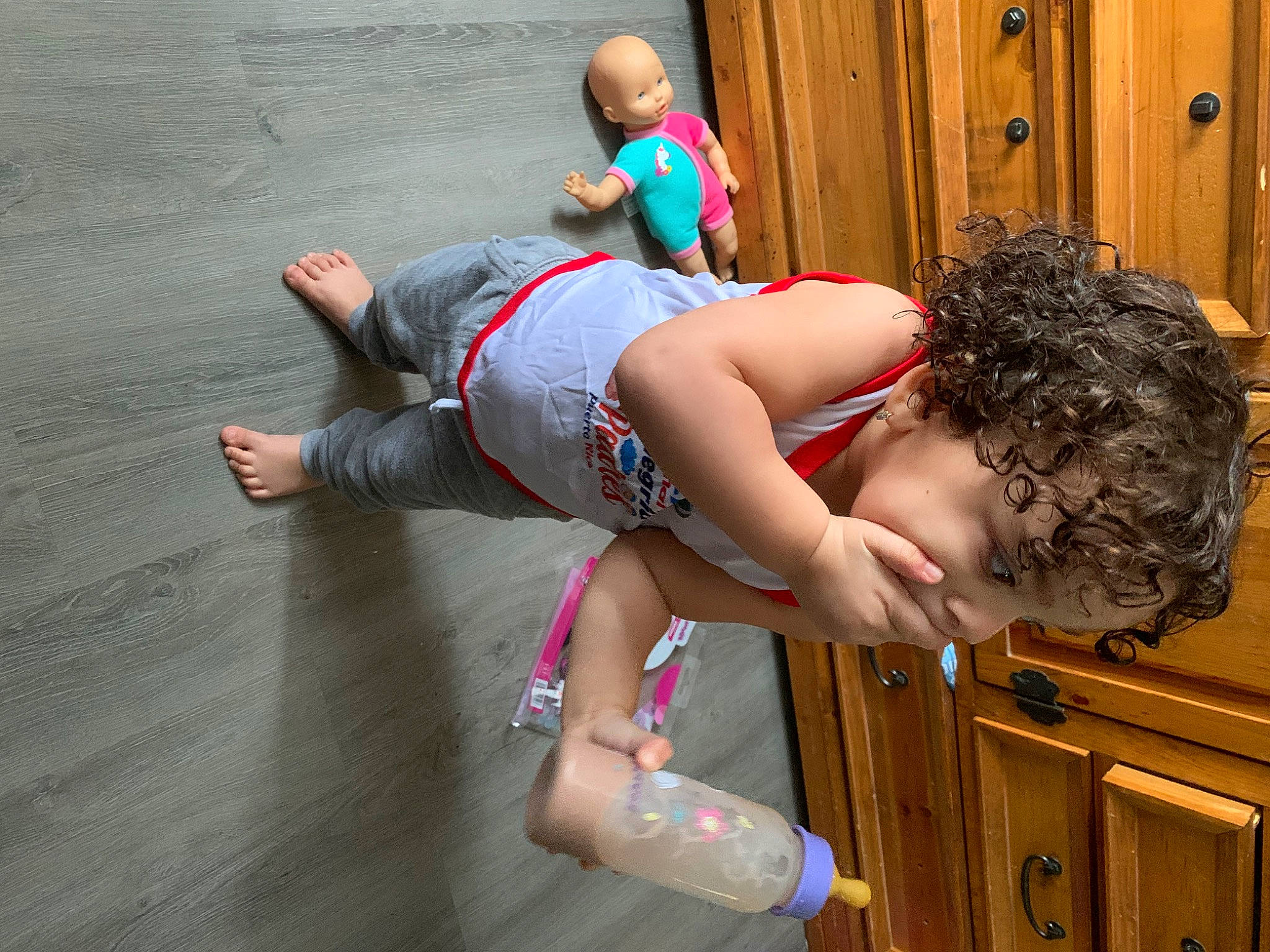 Layla joined the competition — help win amazing prizes! barefoot, calf, child, elbow, entertainment, flooring, foot, fun, human_leg, knee, leisure, person, play, recreation, sitting, sportswear, swimwear, t_shirt, thigh, toddler
