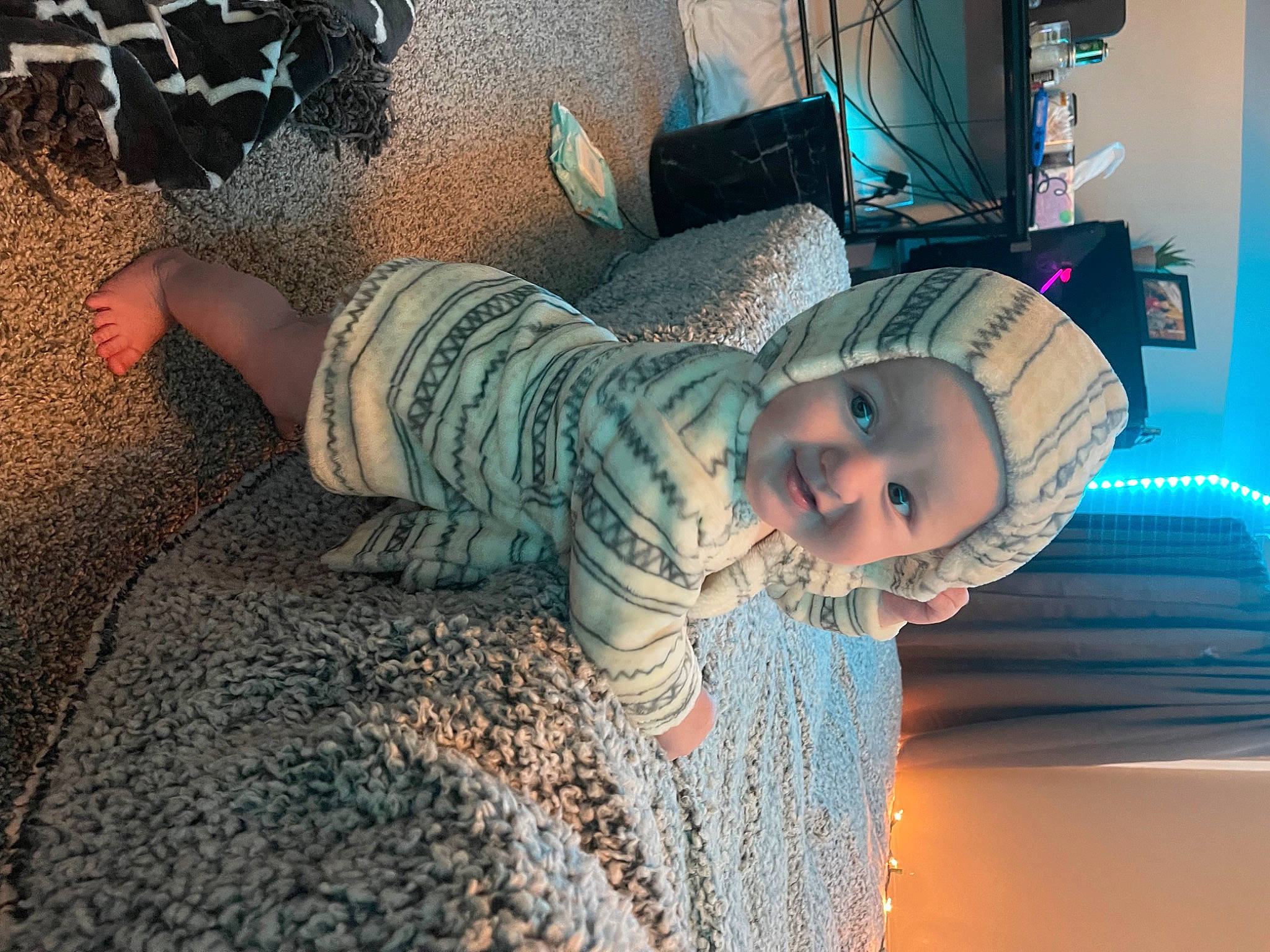 Blaze is registered to the contest to win money with this photo: blue, child, electric_blue, eyewear, fashion_accessory, flash_photography, flooring, fun, happy, hat, headwear, human_leg, magenta, pattern, person, personal_protective_equipment, selfie, sitting, smile, tints_and_shades