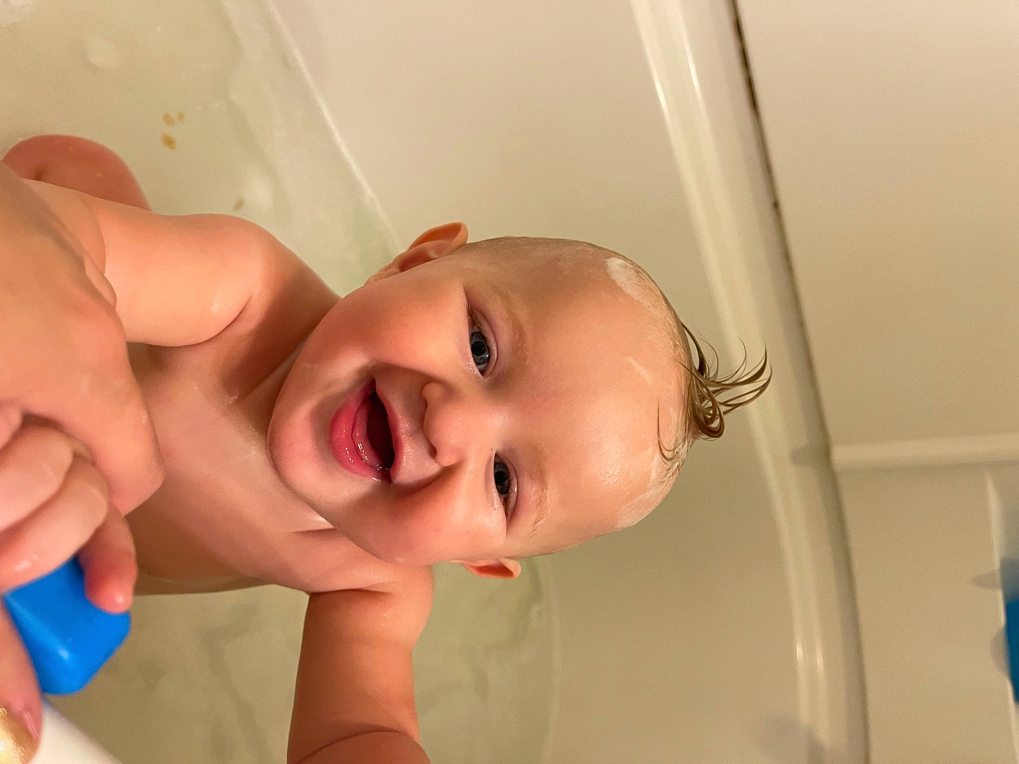 Blaze is registered to the contest to win money with this photo: baby, bathing, cheek, chest, ear, eyebrow, eyelash, finger, gesture, hand, happy, iris, jaw, joy, lip, mouth, neck, nose, person, skin