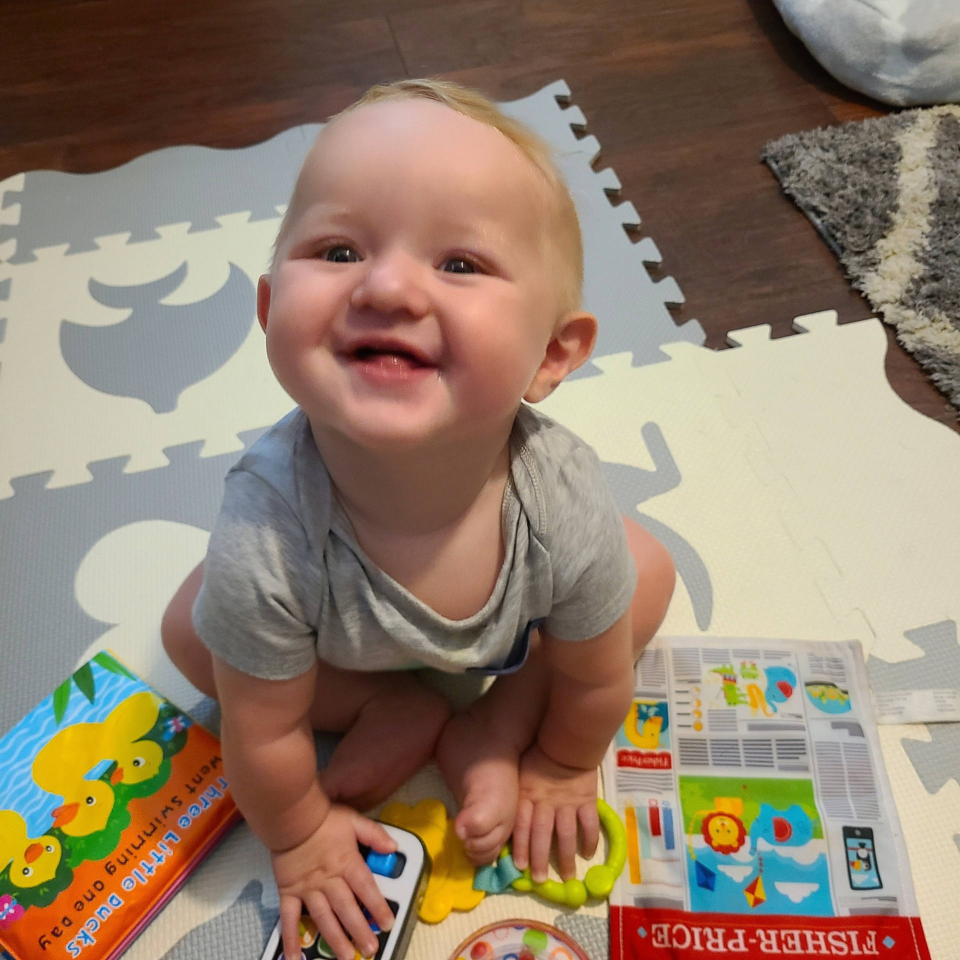 Blaze is registered to the contest to win money with this photo: baby, baby_playing_with_toys, baby_toddler_clothing, baby_toys, cheek, child, cloud, design, flooring, fun, happy, joy, nose, person, play, room, skin, smile, t_shirt, toddler