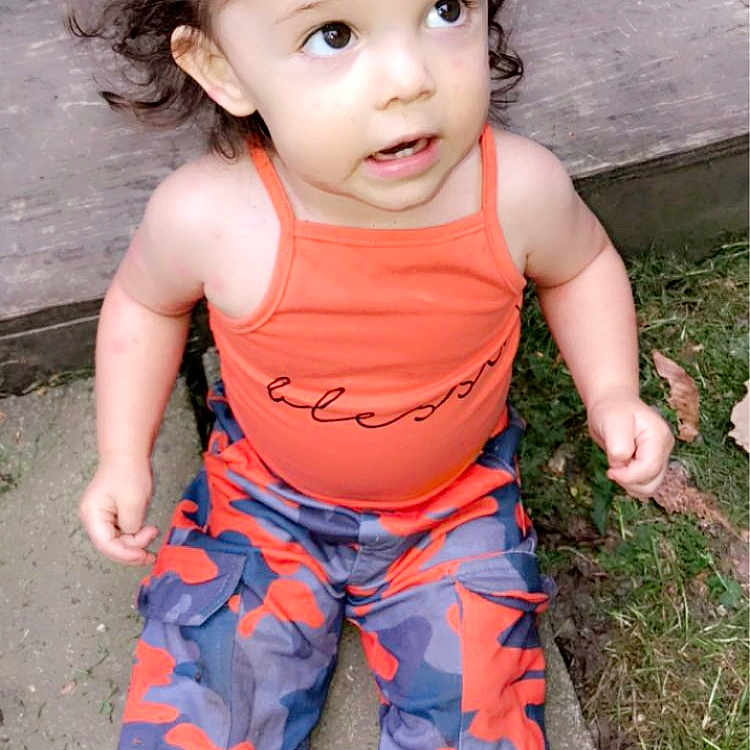 Nevaeh joined the competition — help win amazing prizes! baby, bodypart, clothing, dress, face, finger, grass, hand, head, jeans, pants, person, photography, plant, portrait, rock, shorts, sitting, tanktop, walking