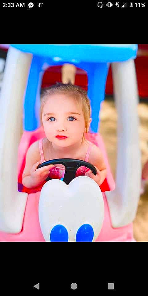 Danielle is registered to the contest to win money with this photo: baby, baby_products, baby_toddler_clothing, child, electric_blue, entertainment, event, face, flash_photography, fun, hair, hairstyle, happy, head, leisure, magenta, performing_arts, person, recreation, sitting