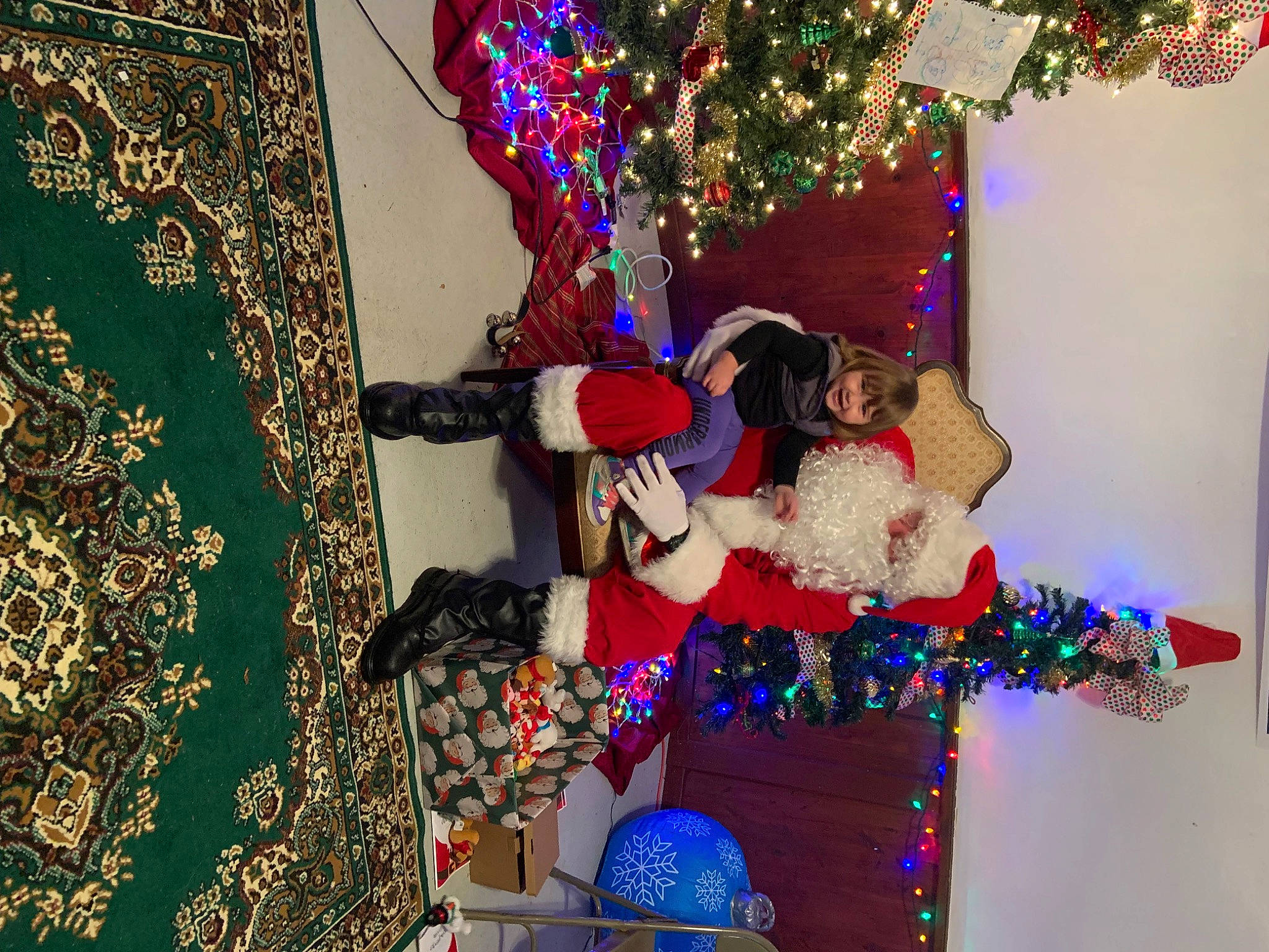 Everleigh is registered to the contest to win money with this photo: christmas, christmas_ornament, decoration, event, fun, happy, holiday, interior_design, joy, leisure, magenta, ornament, party, party_supply, pattern, person, pink, purple, room, textile