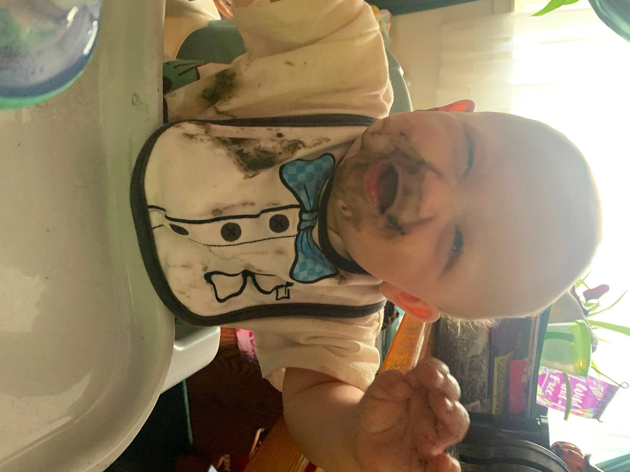 Slayde joined the competition — help win amazing prizes! baby, baby_products, car_seat, child, eyewear, fun, green, hat, mouth, person, personal_protective_equipment, plastic, room, thumb, toddler, vehicle_door