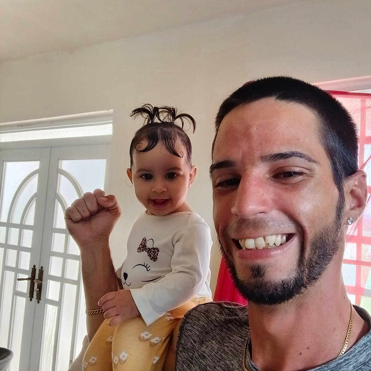 Jenibeth joined the competition — help win amazing prizes! child, toddler, man, smiling, happy, indoor, person, holding, family, cute, hair, face, casual, home, window, light, clothing, portrait, fun, together