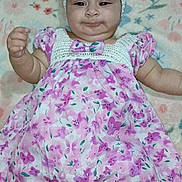 Jenibeth is registered to the contest to win money with this photo: adorable, baby, blanket, child, chubby_cheeks, cute, dress, floral, flower, footwear, happy, headband, indoor, infant, infant_clothing, lying_down, person, pink, smile, soft_texture