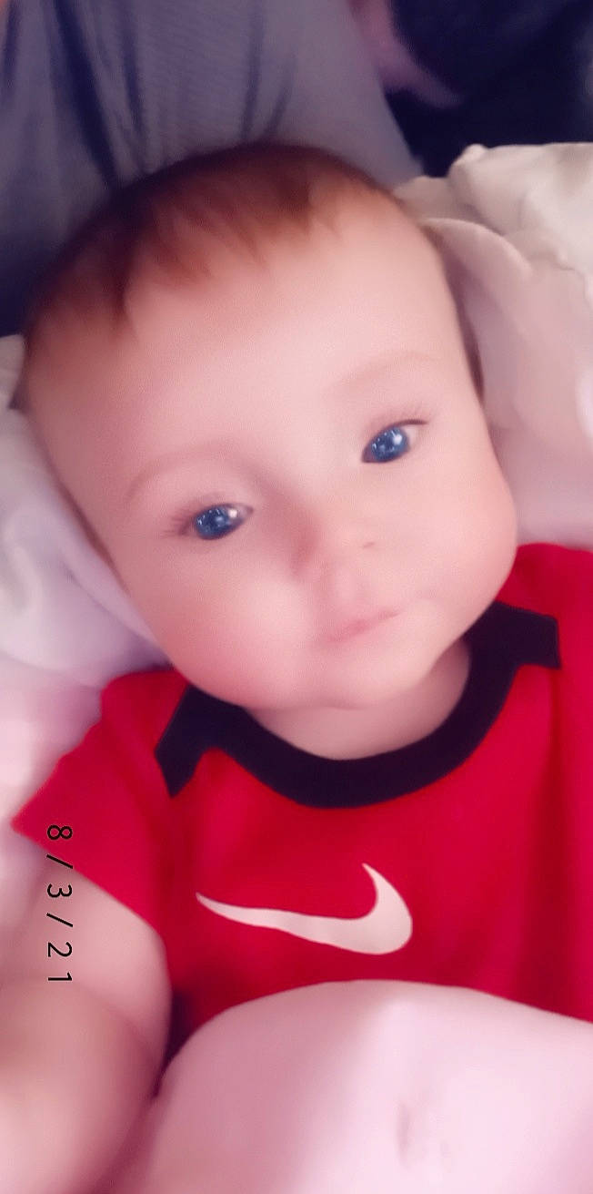 Briana is registered to the contest to win money with this photo: cheek, chin, cool, eye, eyebrow, eyelash, finger, flash_photography, forehead, happy, human_body, iris, lip, mouth, nose, person, pink, skin, sleeve, toddler