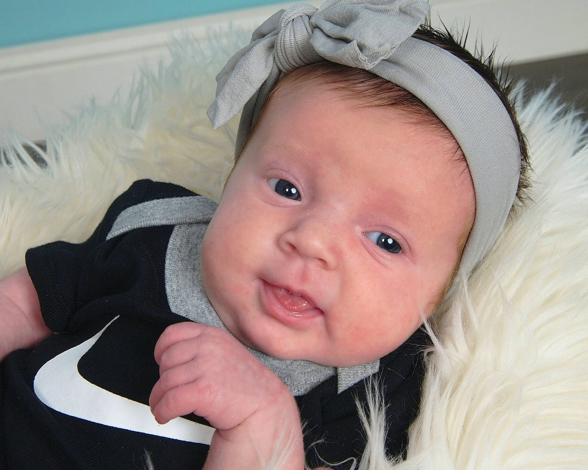 Briana joined the competition — help win amazing prizes! baby, baby_toddler_clothing, beauty, cap, cheek, child, chin, eyebrow, eyelash, face, facial_expression, gesture, happy, headgear, iris, lip, person, skin, smile, textile