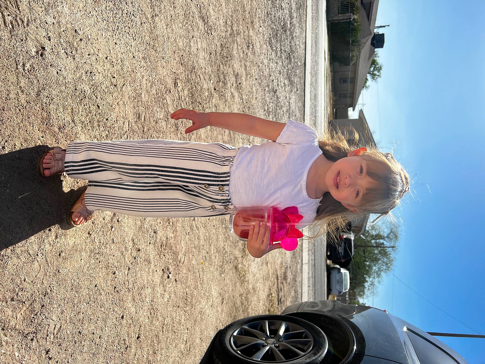 Addilyn joined the competition — help win amazing prizes! alloy_wheel, automotive_design, automotive_lighting, automotive_tire, automotive_wheel_system, bumper, car, hood, hubcap, joy, landscape, light, motor_vehicle, person, rim, sky, tire, vehicle, vehicle_door, wheel