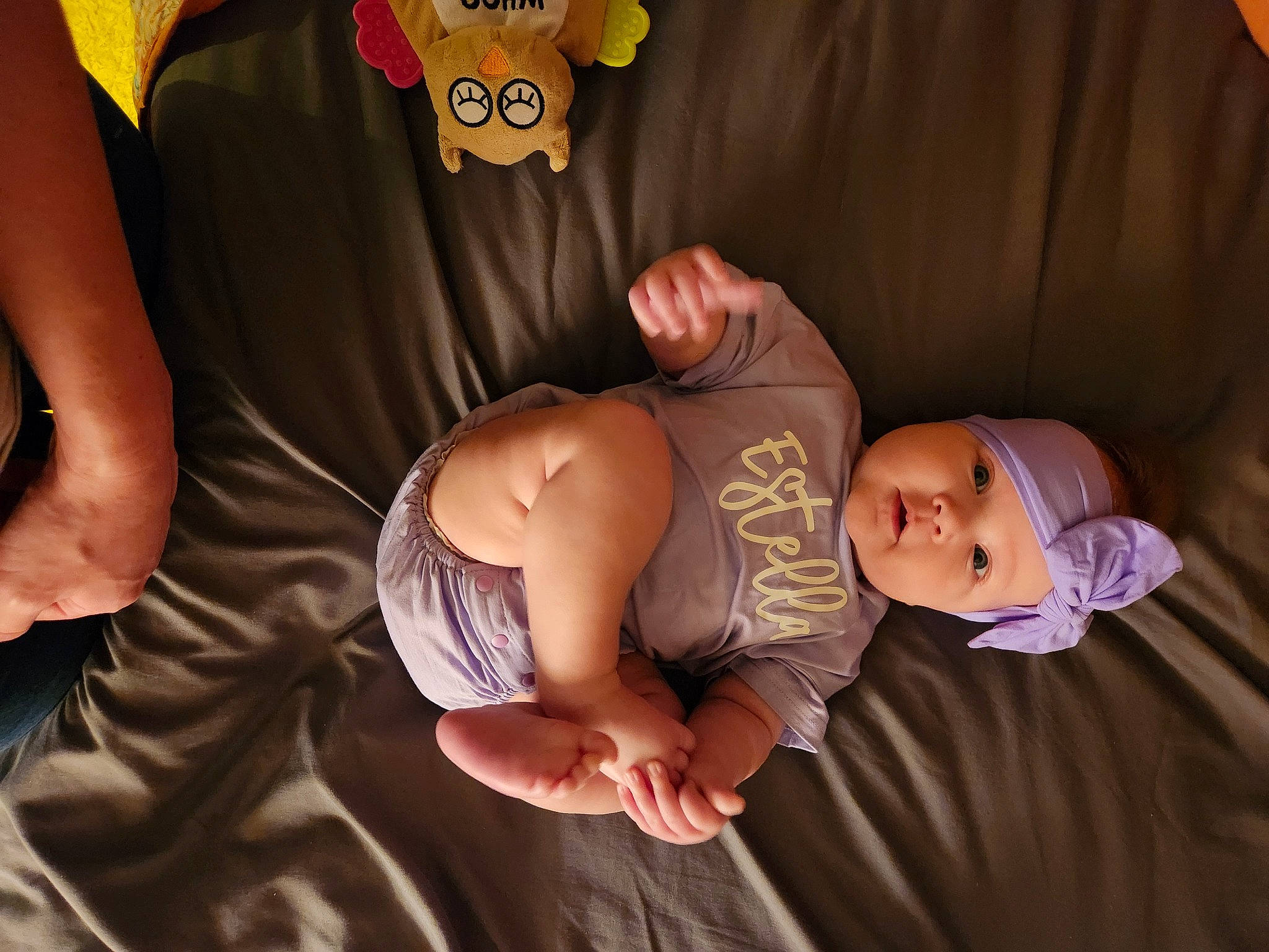 Estella joined the competition — help win amazing prizes! abdomen, baby, baby_toddler_clothing, chest, child, comfort, elbow, eye, finger, gesture, hand, head, headwear, human_body, leg, mammal, person, skin, stomach, thigh
