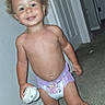 Karma joined the competition — help win amazing prizes! child, toddler, smiling, portrait, indoor, hallway, carpet, standing, curly_hair, purple_socks, shoes, mismatched_shoes, diaper, underwear, laughing, happy, playful, home, doorway, casual_photo