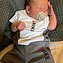 baby, pacifier, sleeping, clothing, nike, infant, hand, face, foot, blanket, cushion, bed, cute, relaxed, toddler, indoor, person, soft, skin, resting