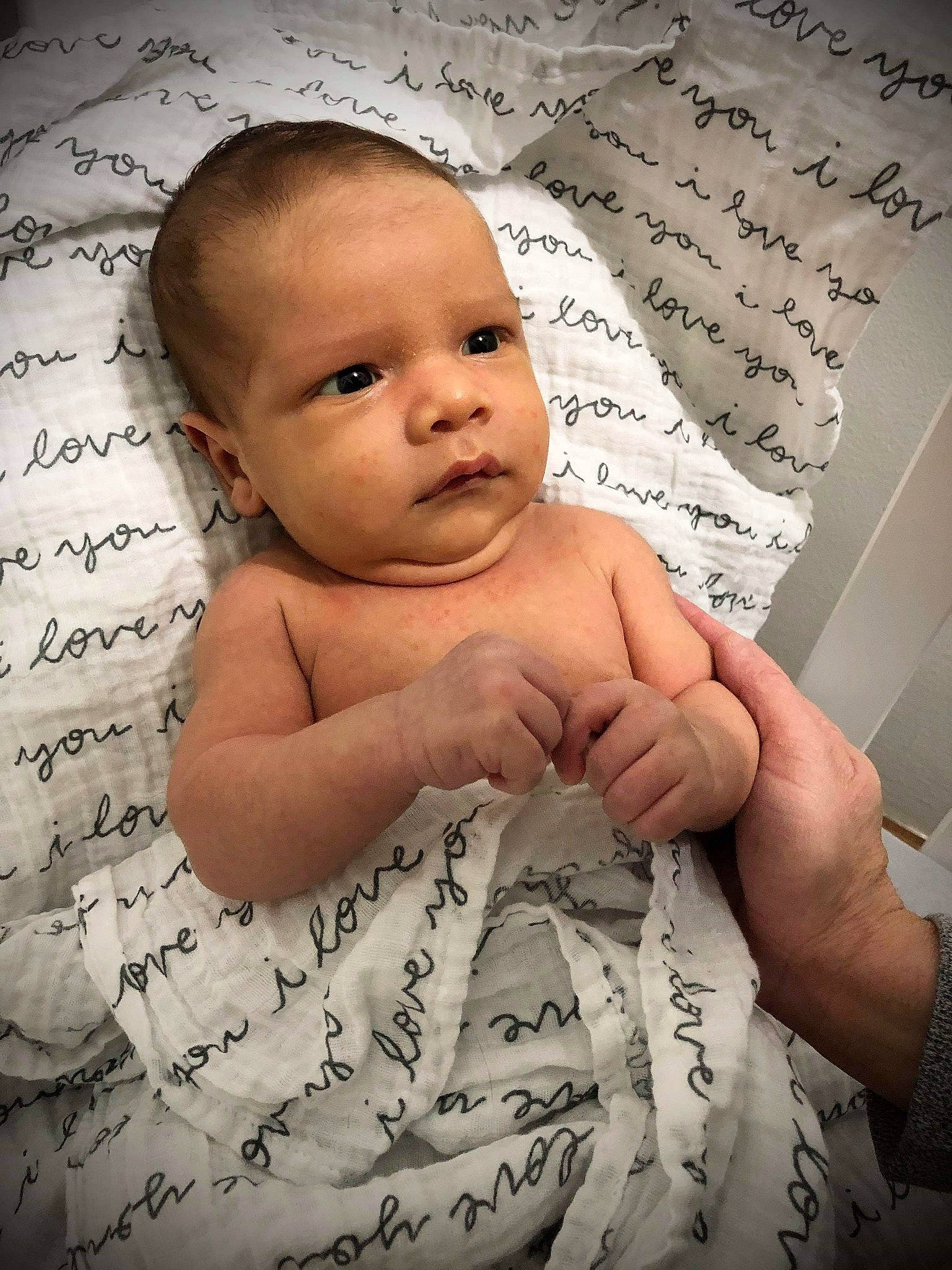 Emrys is registered to the contest to win money with this photo: baby, cheek, child, finger, forehead, hand, muscle, nose, person, skin, smile, toddler