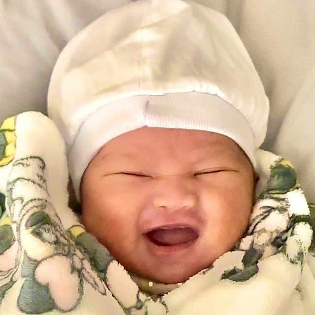 Daisy Elise joined the competition — help win amazing prizes! baby, babylaughing, bed, blanket, bonnet, cap, clothing, face, furniture, glove, happy, hat, head, laughing, newborn, person, photography, portrait, sleeping, yawning