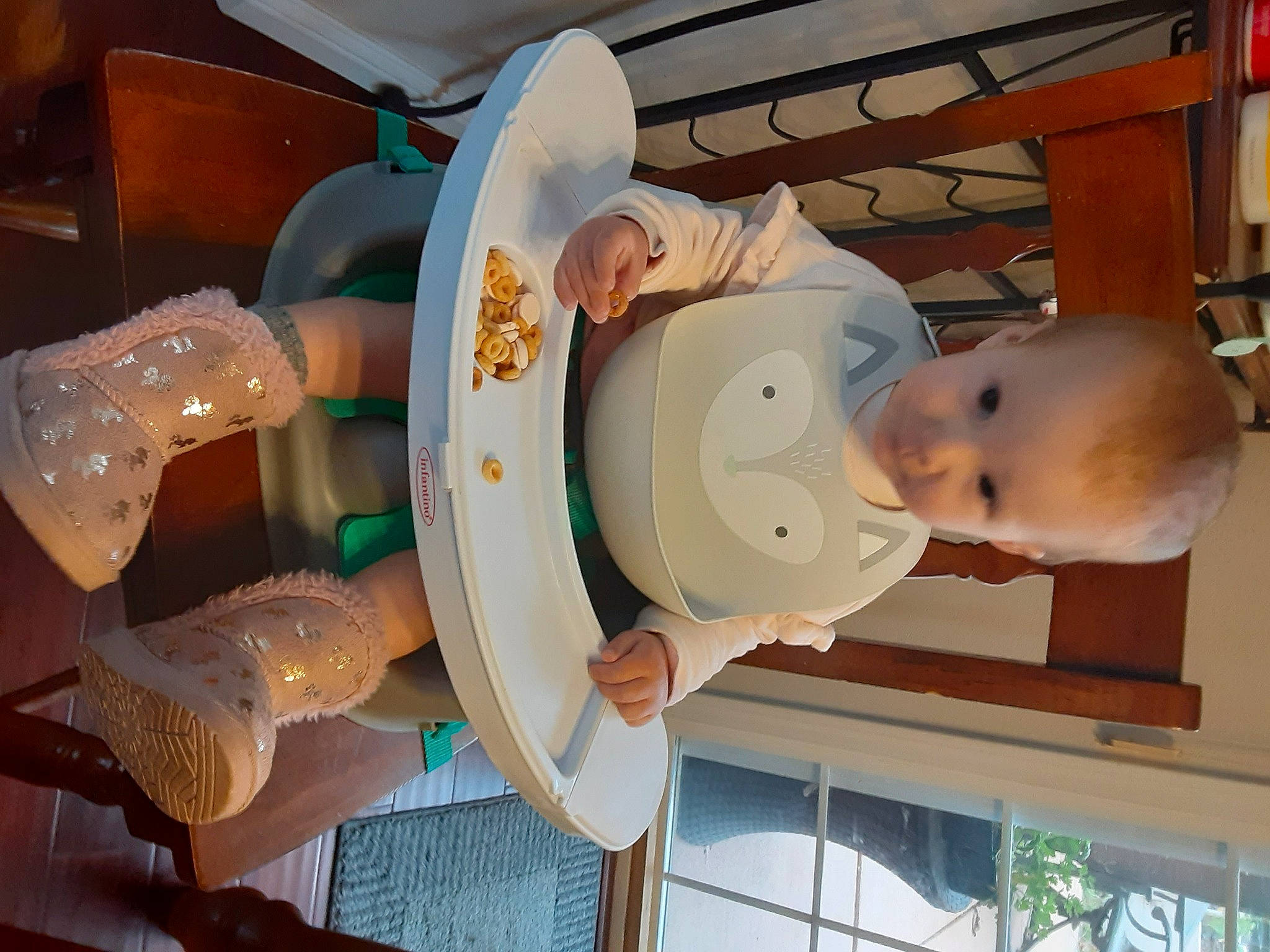 Davina joined the competition — help win amazing prizes! baby, baby_products, baby_safety, baby_toddler_clothing, baby_toys, child, circle, cooking, food, hat, headgear, party_supply, person, plastic, room, shelf, smile, tableware, toddler, window