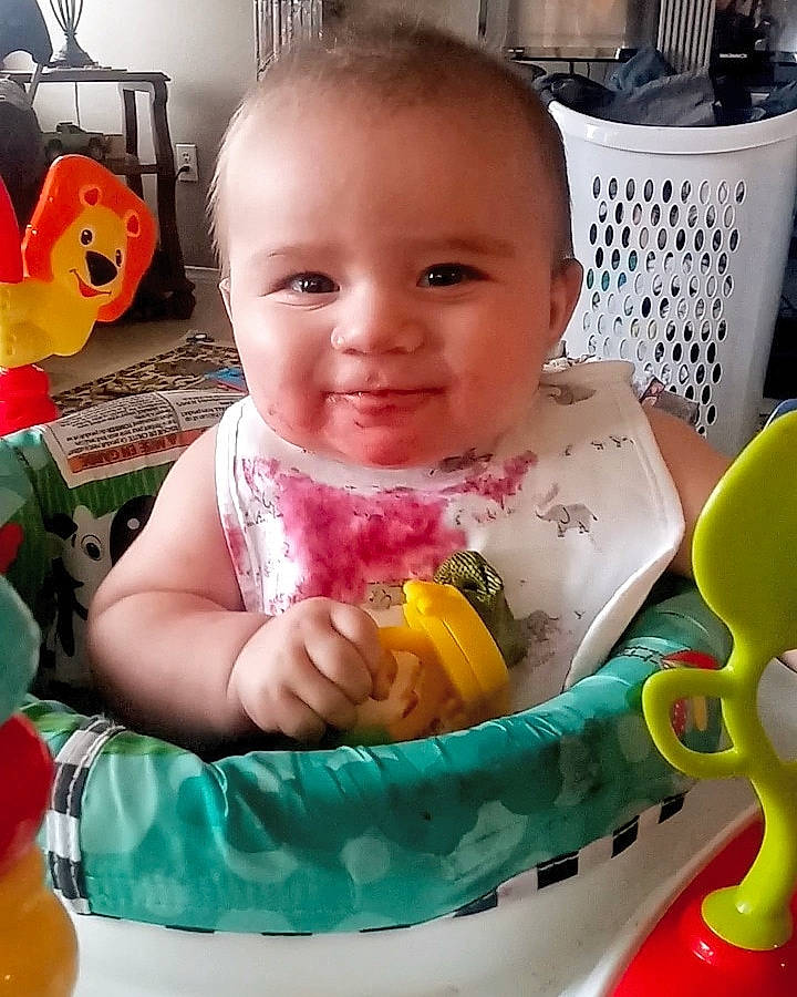 Gilbert joined the competition — help win amazing prizes! baby, baby_food, child, comfort_food, eating, food, fun, joy, person, play, sitting, skin, toddler, toy