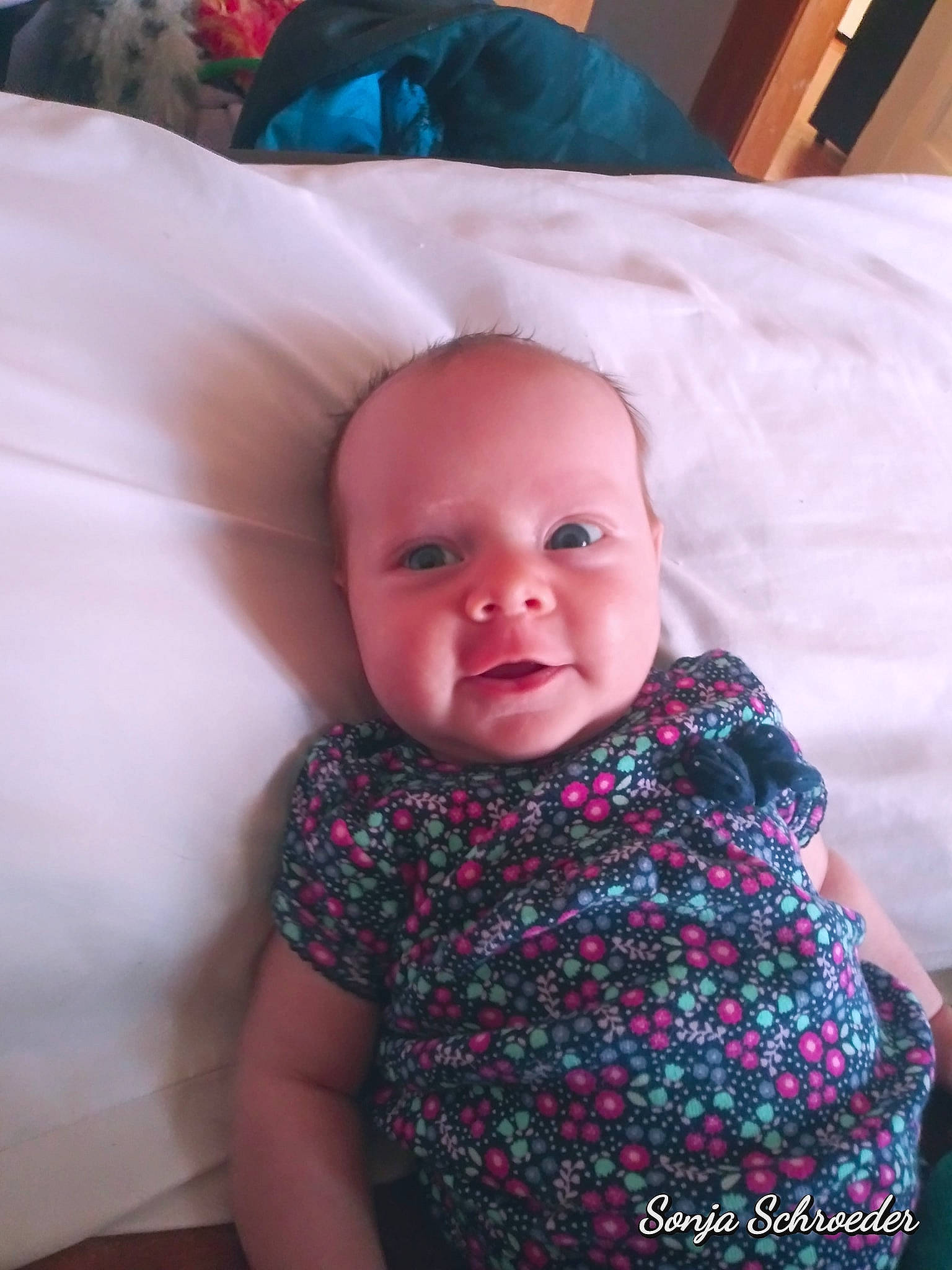 Wyllow joined the competition — help win amazing prizes! baby, cheek, child, eye, face, head, linens, lip, person, pink, room, skin, smile, textile, toddler