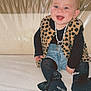 baby, child, smiling, leopard_print, vest, denim, shorts, black_tights, socks, bow, happy, sitting, indoor, couch, cute, portrait, person, fashion, accessory, young_child