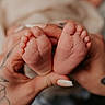 baby, feet, hands, tattoo, manicure, closeup, skin, infant, newborn, love, heart_shape, nails, adult, soft_focus, intimacy, parental_love, warmth, holding, human, tenderness