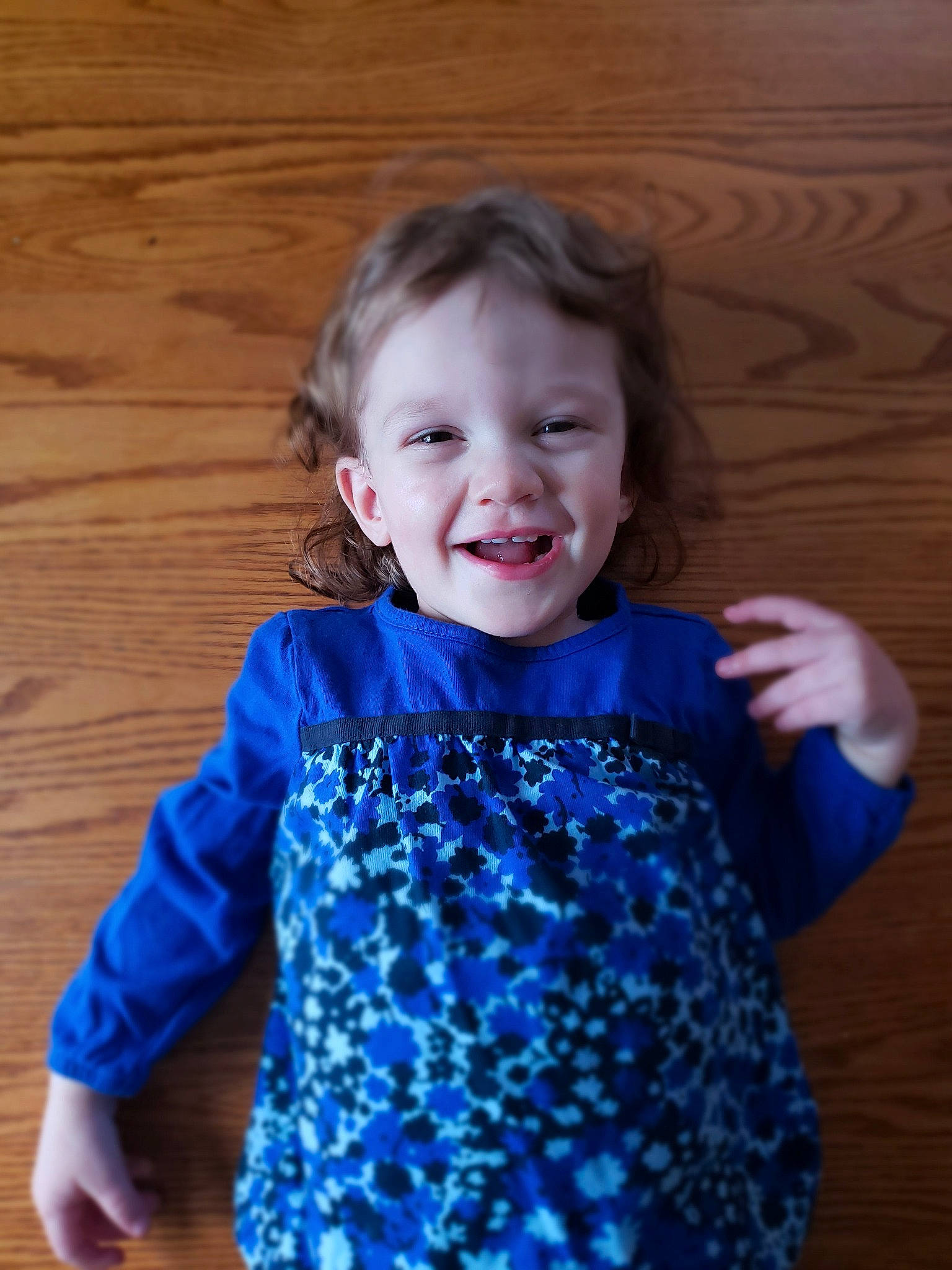 Brooklyn is registered to the contest to win money with this photo: baby, blue, child, cobalt_blue, dress, electric_blue, facial_expression, happy, joy, laugh, outerwear, pattern, person, play, sleeve, smile, toddler, top