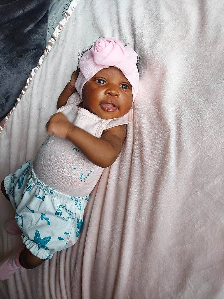 Halo joined the competition — help win amazing prizes! abdomen, arm, baby, baby_toddler_clothing, child, comfort, elbow, eye, flash_photography, happy, headwear, human_leg, linens, mouth, navel, person, skin, sleeve, smile, thigh