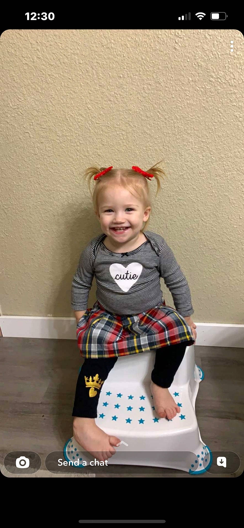 Briella joined the competition — help win amazing prizes! arm, baby_toddler_clothing, child, dress, face, facial_expression, fun, hair, hairstyle, happy, head, joy, knee, pattern, person, plaid, sleeve, smile, sock, t_shirt