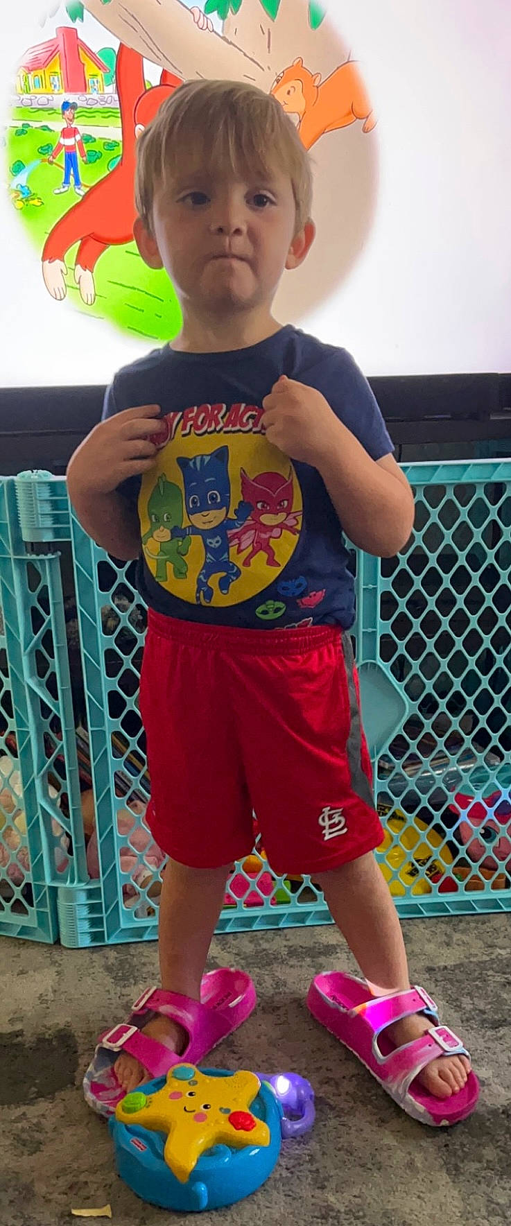 Alexander is registered to the contest to win money with this photo: baby_toddler_clothing, board_short, electric_blue, eyewear, fun, green, happy, human_leg, leisure, orange, person, pink, shorts, sleeve, summer, t_shirt, thigh, toddler, trunks, white
