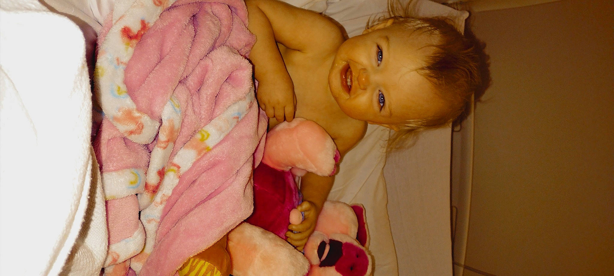 Raelynn is registered to the contest to win money with this photo: baby, baby_products, baby_sleeping, baby_toddler_clothing, cheek, chest, child, comfort, finger, gesture, happy, head, infant_bed, linens, nail, peach, person, pink, skin, thumb