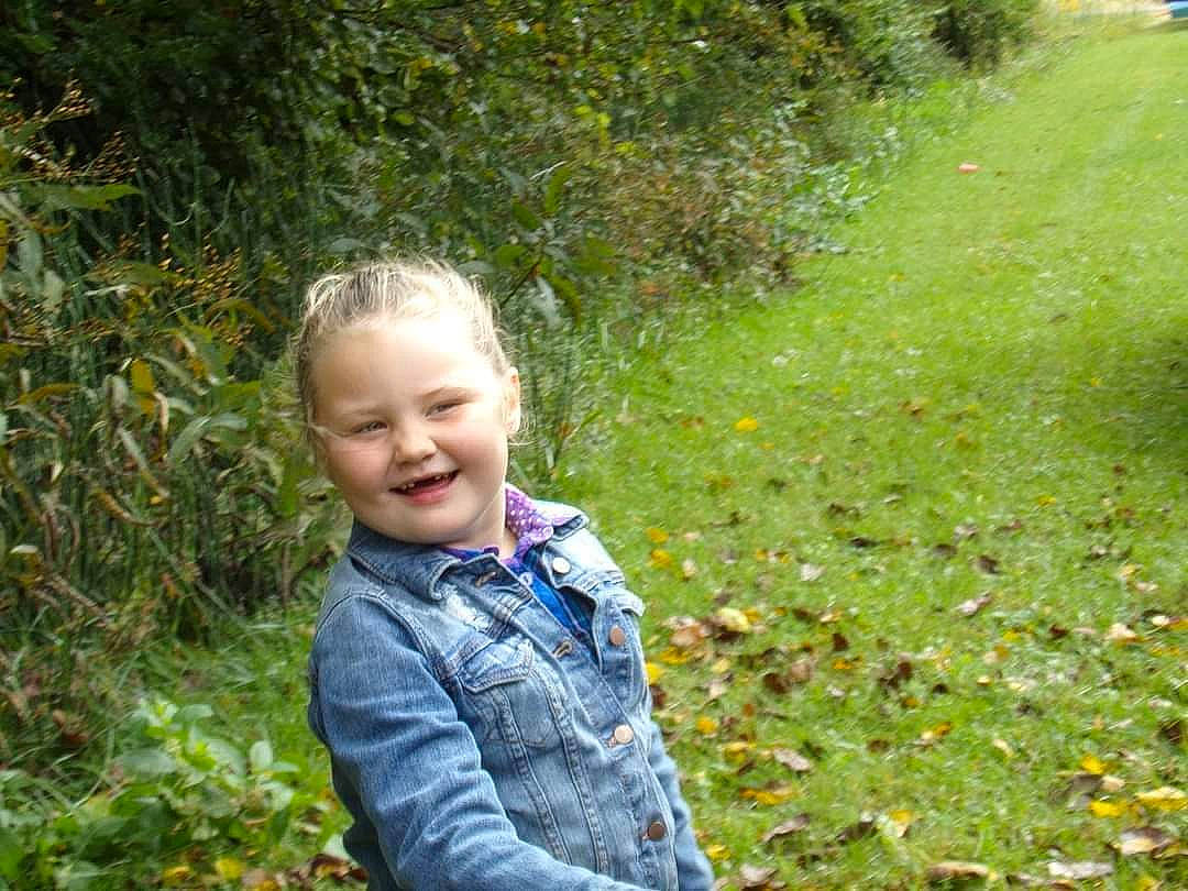 Haylee Ray is registered to the contest to win money with this photo: baby_toddler_clothing, botany, child, garden, grass, grass_family, grassland, groundcover, happy, joy, leaf, meadow, natural_landscape, pattern, people_in_nature, person, plant, shrub, sleeve, smile