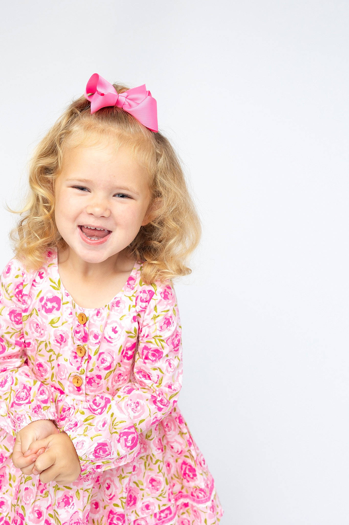 Callie is registered to the contest to win money with this photo: baby_toddler_clothing, child, day_dress, dress, event, eye, face, hair, happy, head, headgear, headpiece, human_body, joy, magenta, pattern, person, pink, skin, sleeve