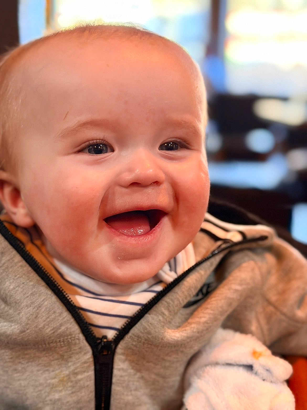 Louis joined the competition — help win amazing prizes! baby, smiling, happy, face, child, jacket, clothing, striped_shirt, closeup, portrait, indoor, cute, cheerful, young, infant, warm, soft_light, expression, human, joyful
