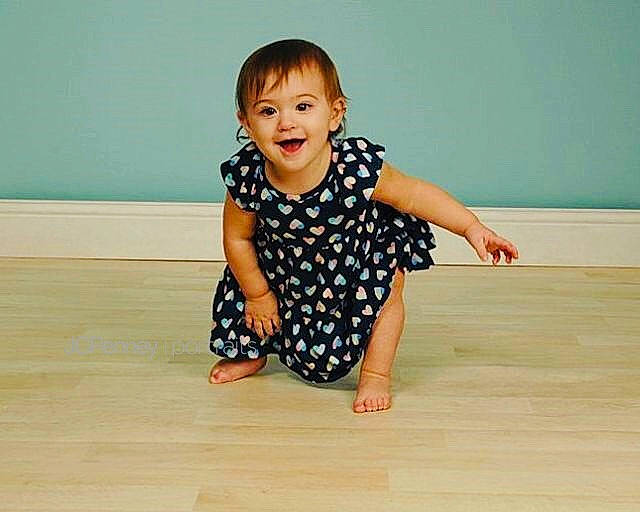 Mia joined the competition — help win amazing prizes! arm, child, crawling, dance, design, facial_expression, floor, flooring, fun, hand, joint, joy, laminate_flooring, leg, pattern, person, play, shoulder, sitting, skin