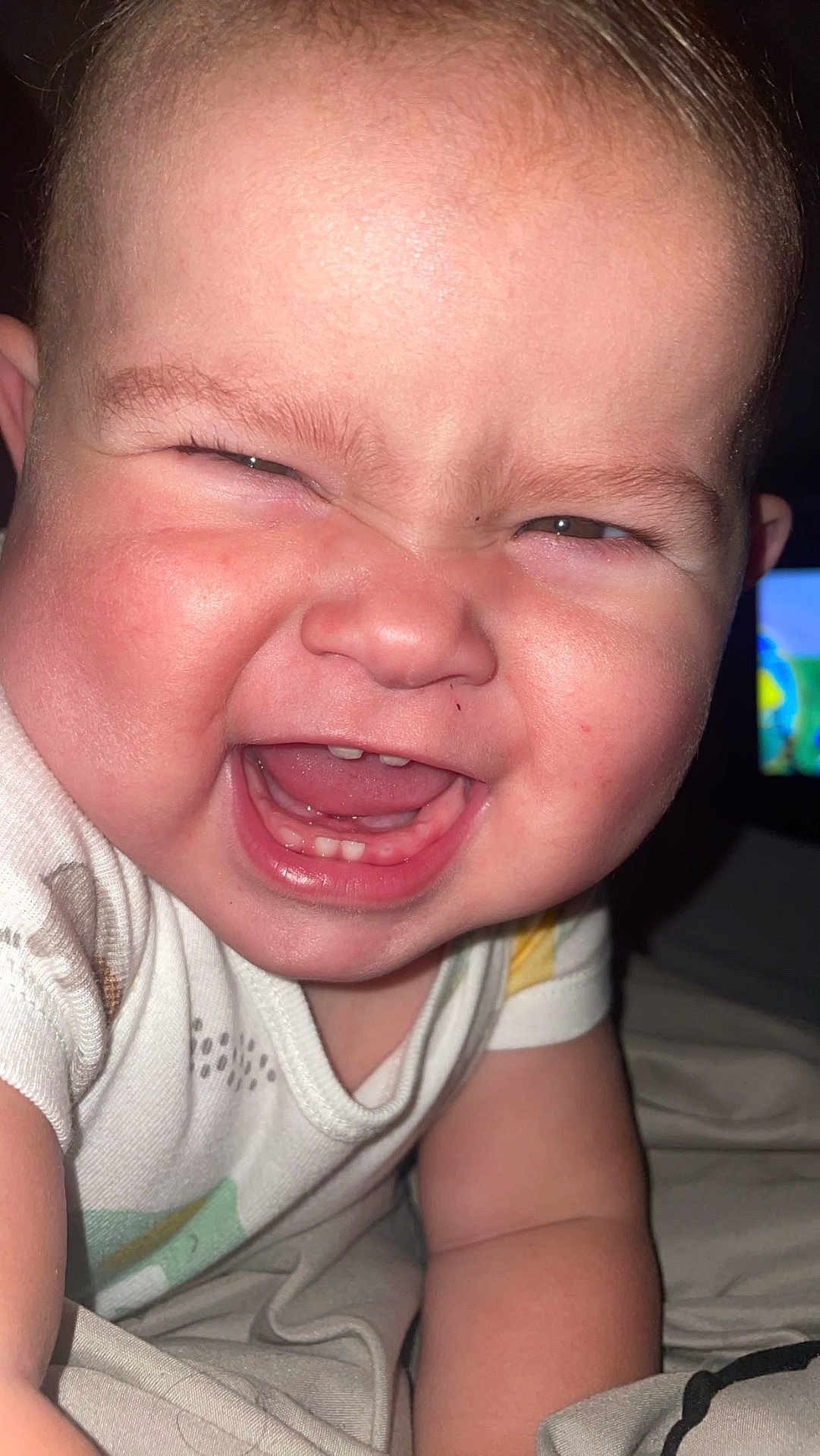 Saylor joined the competition — help win amazing prizes! baby, child, smiling, face, teeth, onesie, cheeks, skin, indoor, candid, joy, expression, closeup, head, arm, human, infant, happy, person, babyclothes