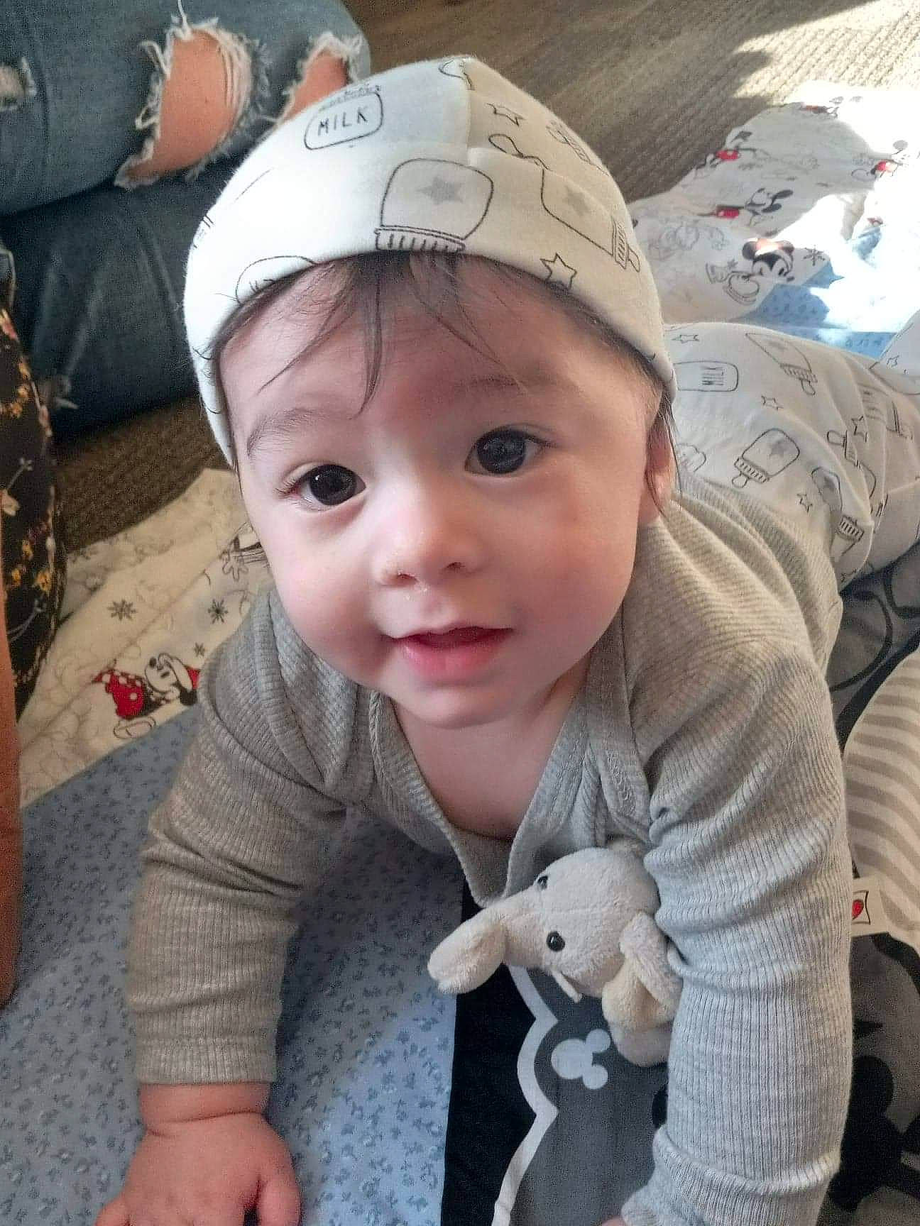 Marc joined the competition — help win amazing prizes! baby, baby_products, baby_toddler_clothing, baseball_cap, cap, cheek, child, cool, cricket_cap, eye, fashion_accessory, finger, happy, headgear, nose, person, sitting, skin, sleeve, t_shirt