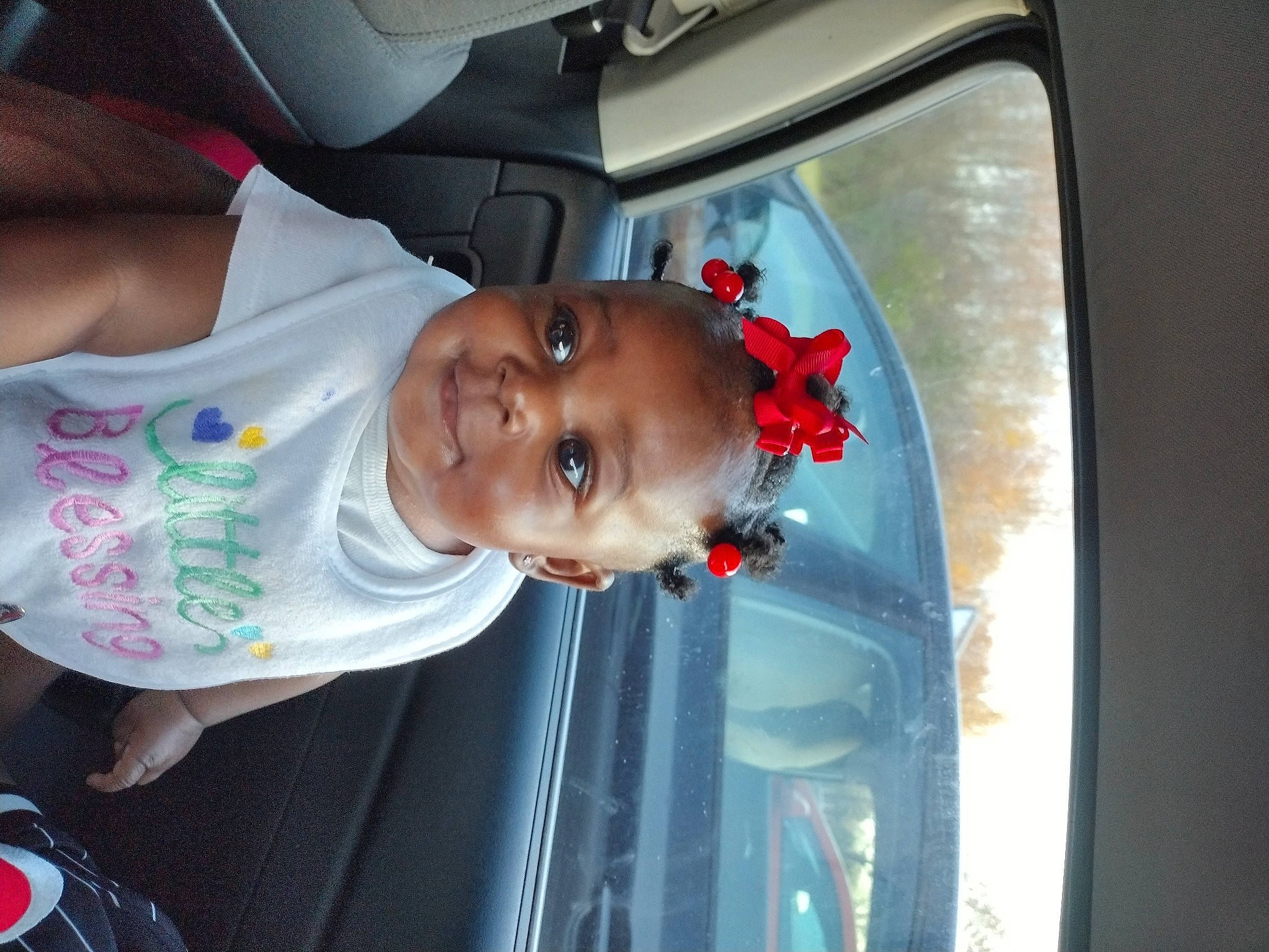 Ariana joined the competition — help win amazing prizes! auto_part, automotive_exterior, automotive_lighting, baby, car, car_seat, child, facial_expression, fun, hairstyle, joy, motor_vehicle, mouth, nose, person, skin, smile, toddler, trunk, vehicle