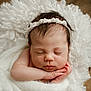 Melba is registered to the contest to win money with this photo: newborn, baby, sleeping, headband, blanket, white, soft, cute, infant, face, hands, peaceful, portrait, closeup, curls, wrapped, resting, cozy, skin, toddler