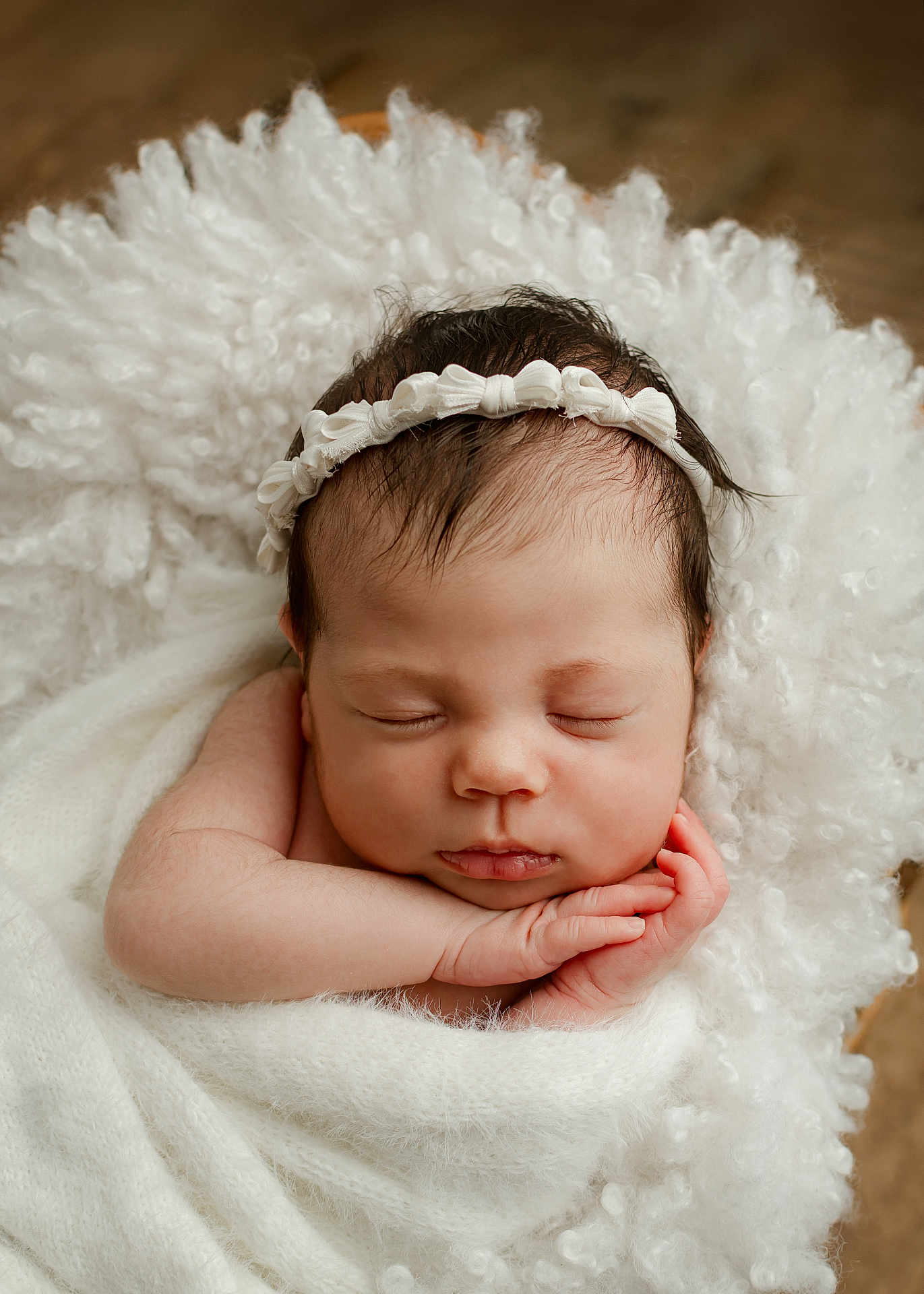 Melba is registered to the contest to win money with this photo: newborn, baby, sleeping, headband, blanket, white, soft, cute, infant, face, hands, peaceful, portrait, closeup, curls, wrapped, resting, cozy, skin, toddler