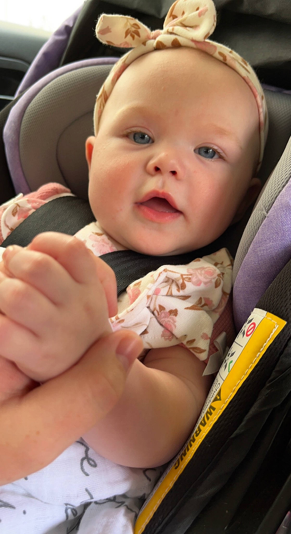 Gracelynn is registered to the contest to win money with this photo: auto_part, baby, baby_products, baby_toddler_clothing, car_seat, cheek, child, comfort, finger, gesture, happy, head_restraint, luxury_vehicle, mouth, nail, person, seat_belt, sitting, skin, thumb