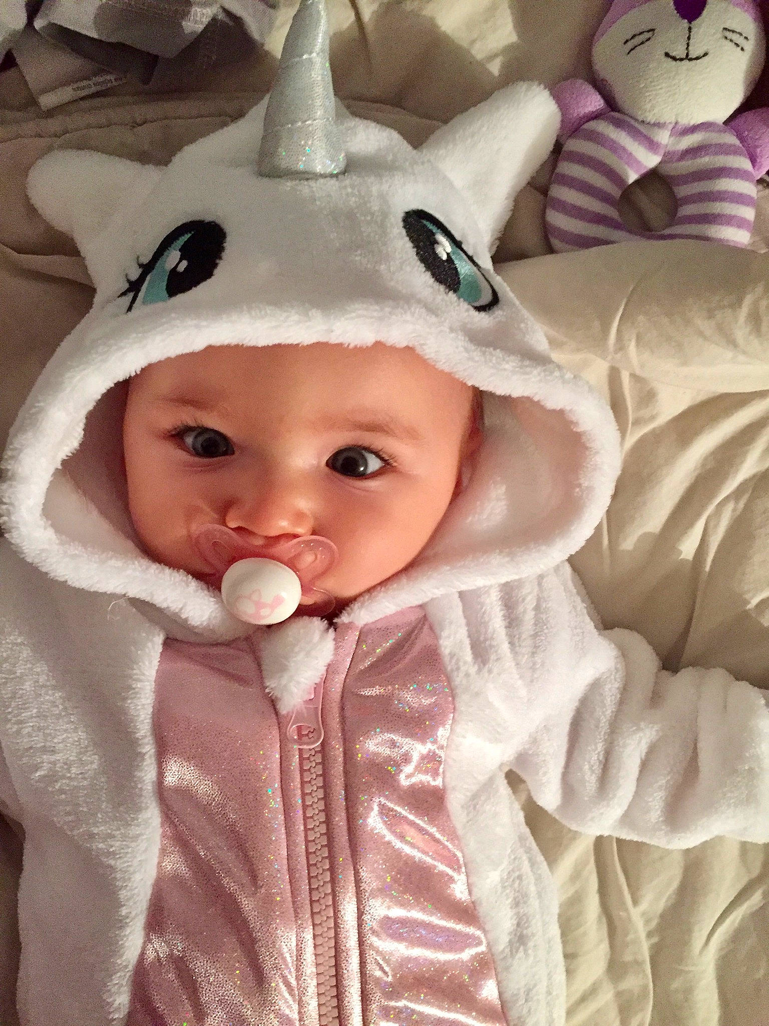 Kahïna participe au concours pour gagner de l'argent avec cette photo : baby, cheek, child, doll, ear, eye, head, headgear, headwear, joy, organ, person, pink, skin, toddler