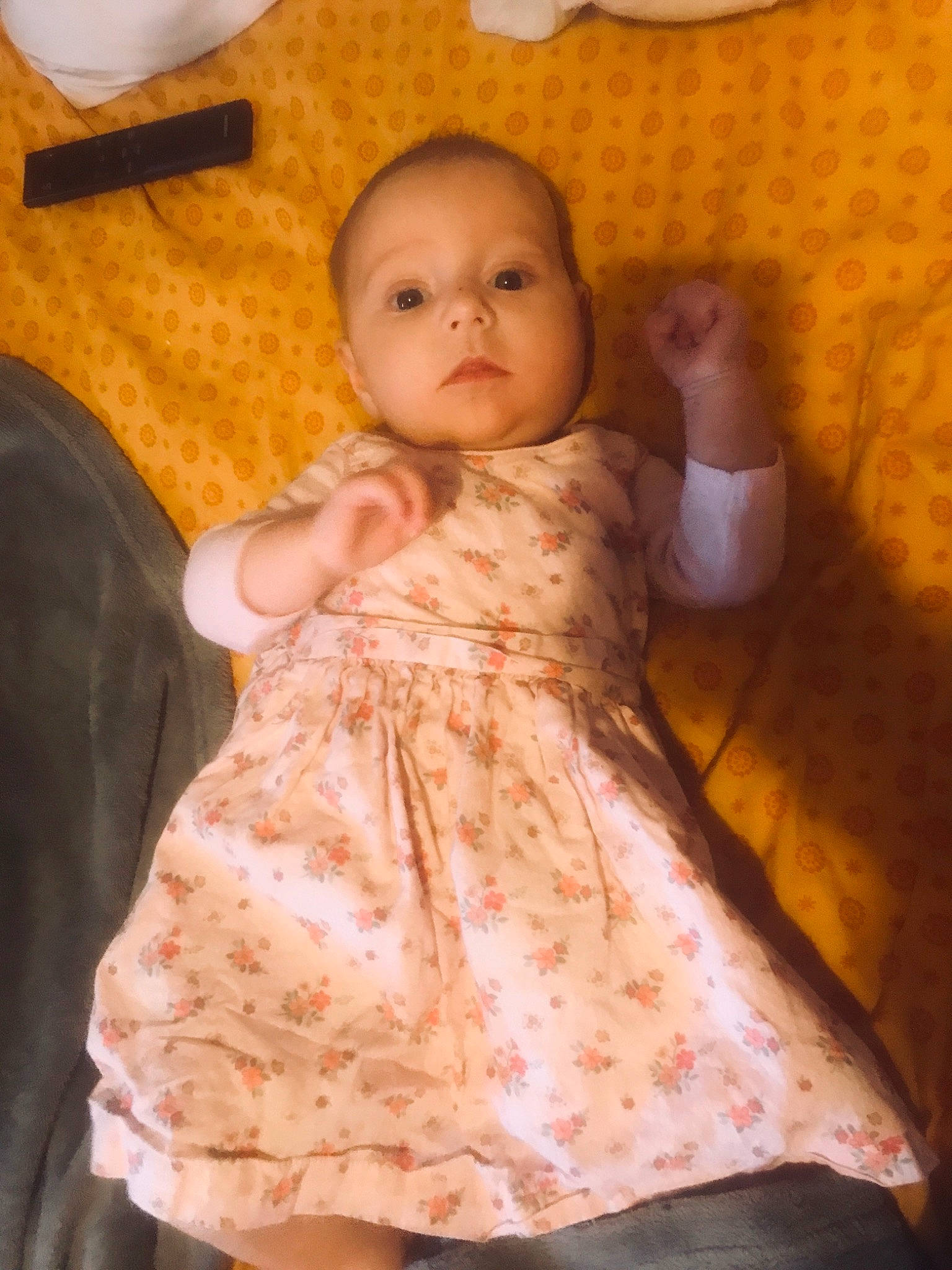 Ilena participe au concours pour gagner de l'argent avec cette photo : baby, baby_toddler_clothing, cheek, child, comfort, day_dress, dress, eye, face, hair, head, human_body, linens, one_piece_garment, organ, person, pink, skin, sleeve, textile